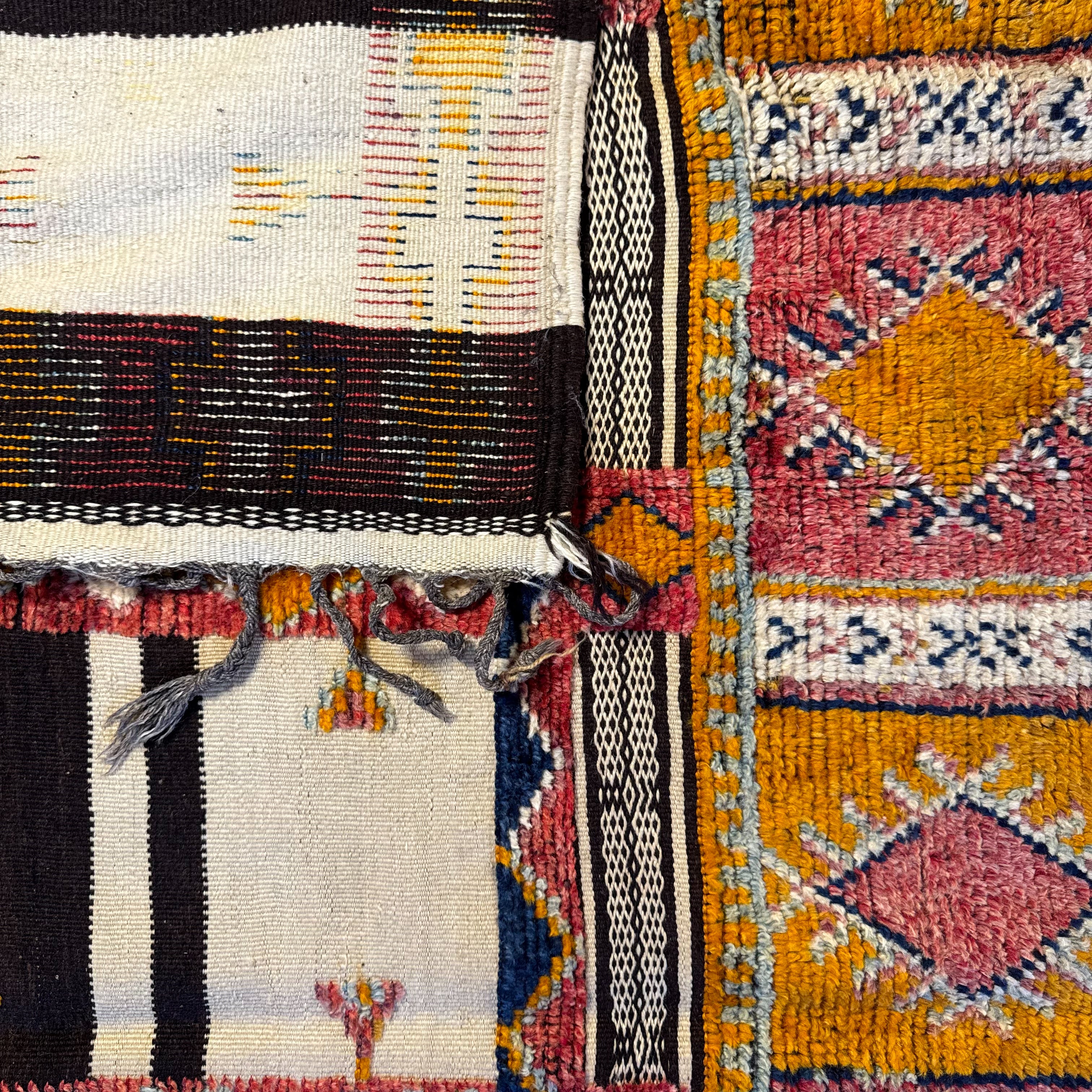 Close-up of various patterned fabrics with different colors and designs.