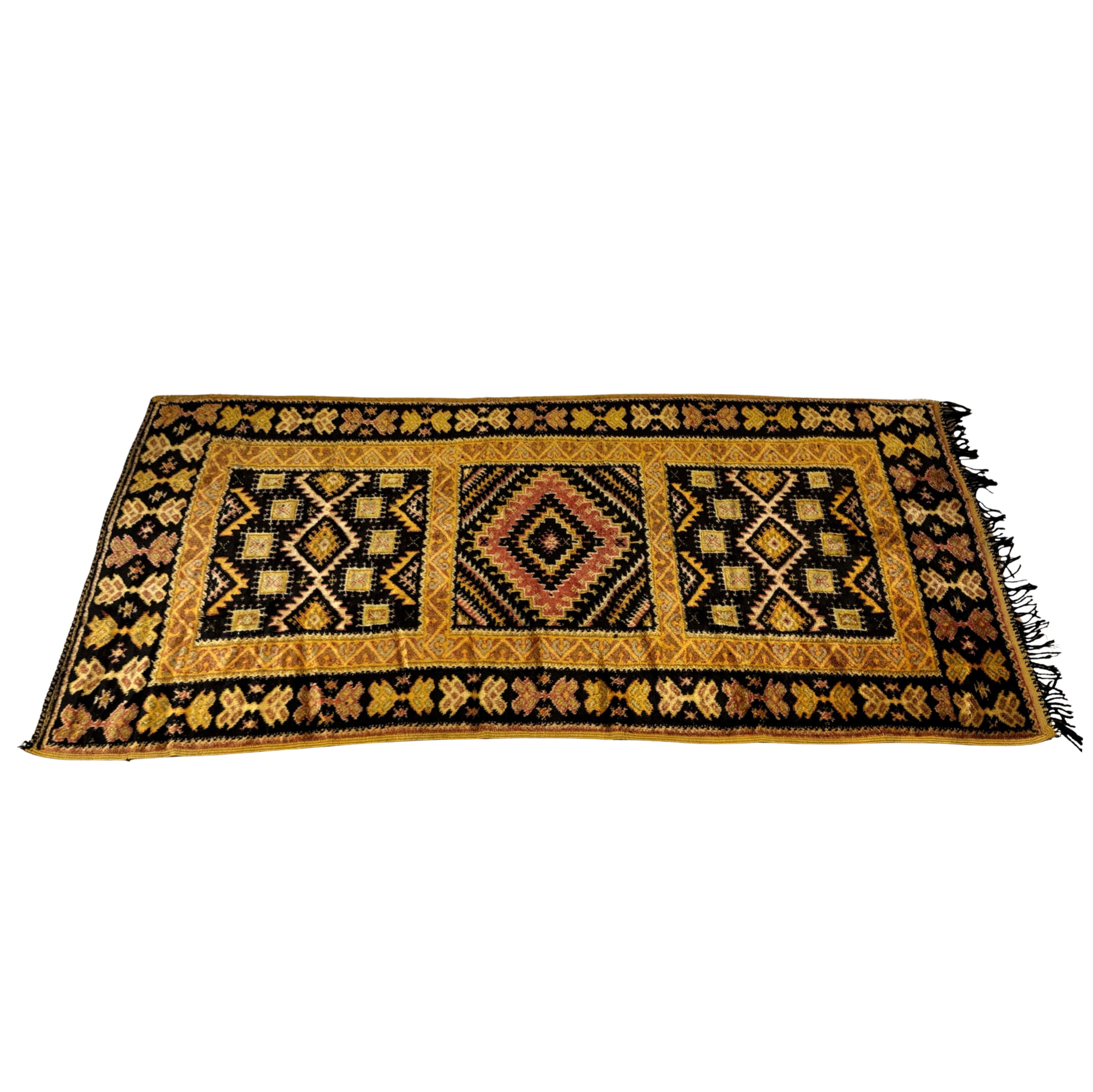 Decorative rug with geometric patterns on a white background